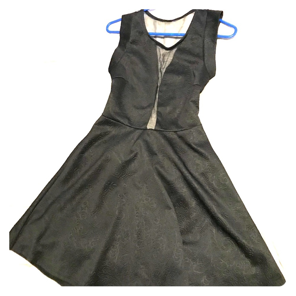 Tiny black dress (with transparent areas)